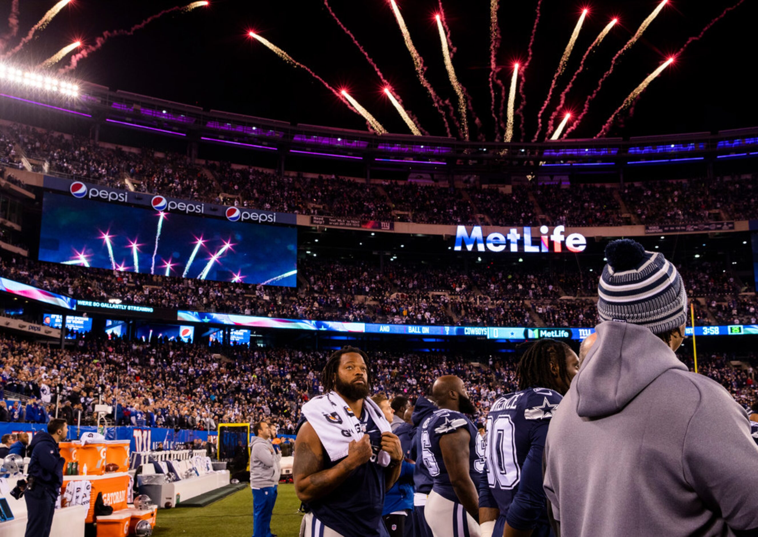 Dallas Cowboys defensive end Michael Bennett (79, center) stands during the playing of the...