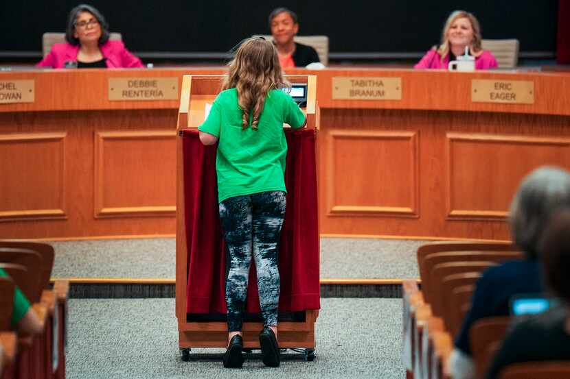A Dartmouth Elementary fifth grader speaks in opposition to changes to the attendance...