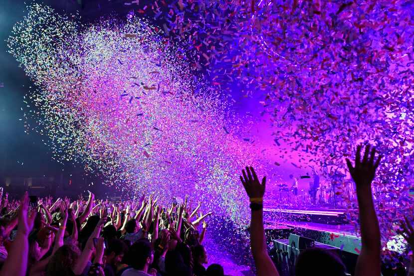 Confetti explodes into the crowd during a Tame Impala performance at the Toyota Music...