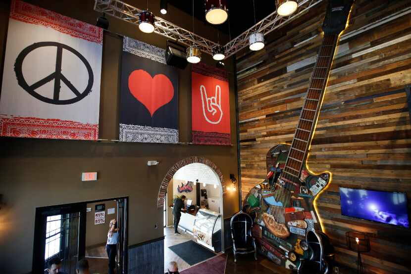 The giant guitar in the entry area of Lava Cantina in The Colony is made with reclaimed...