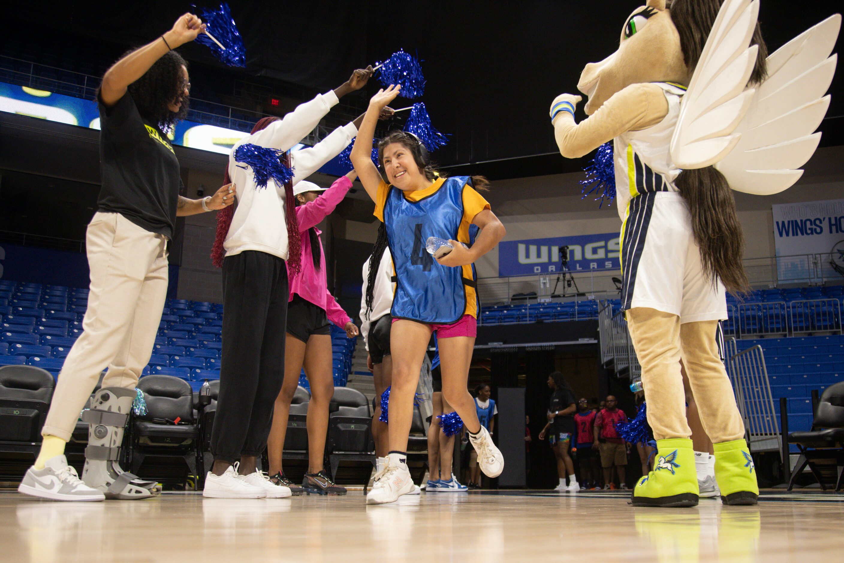 Team Arike’s Miranda Estrada (4) runs out to the court before the Unified Game hosted by the...