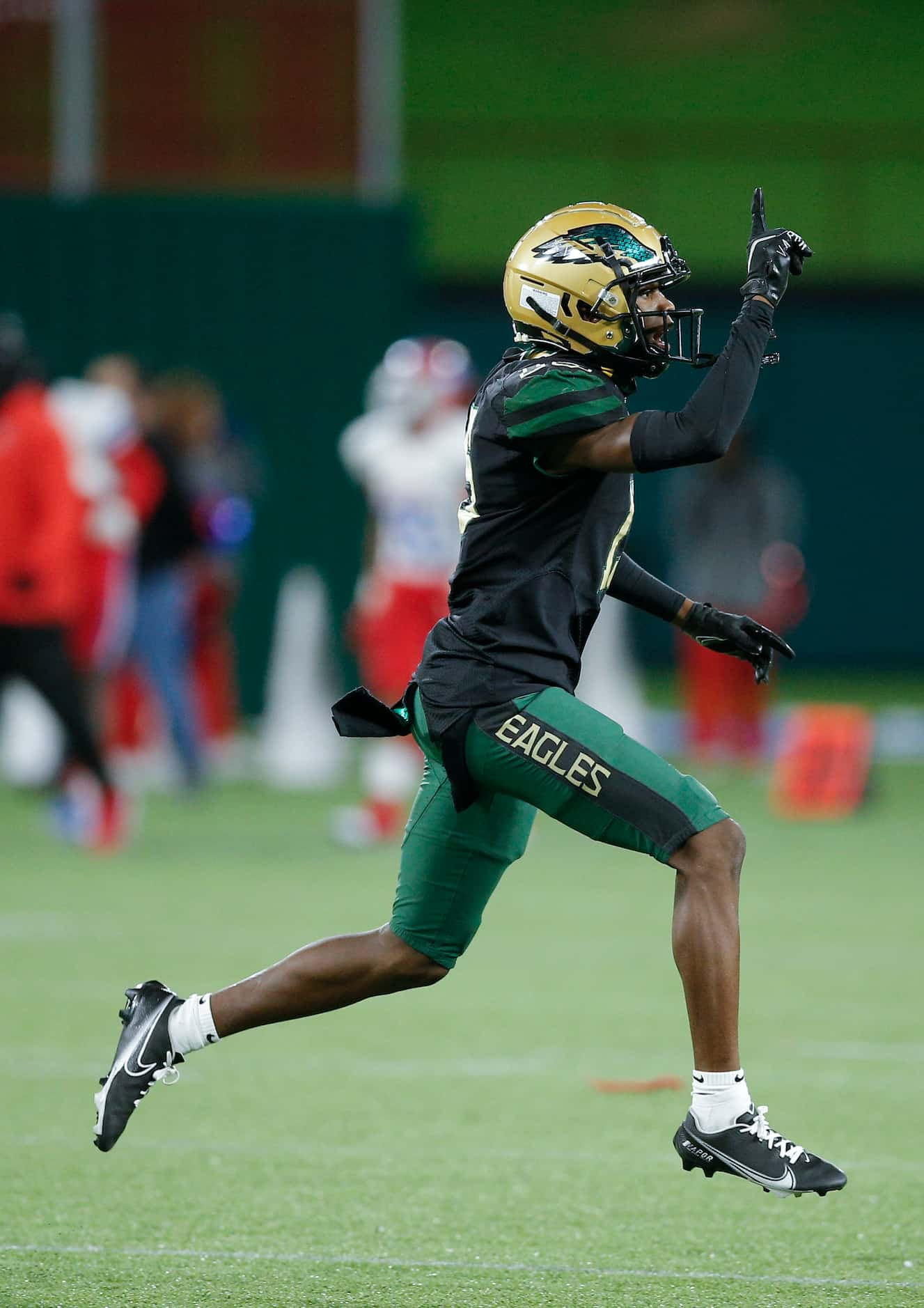 DeSoto senior cornerback Ashton Levells (15) celebrates intercepting a pass during the first...