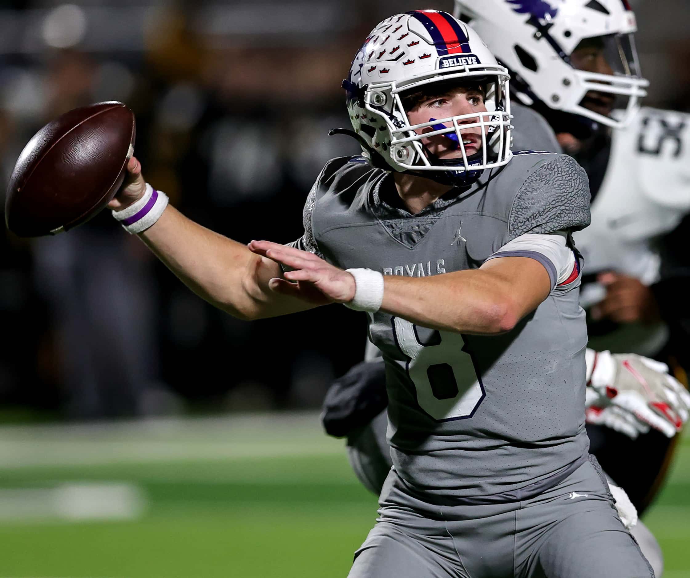 Richland quarterback Drew Kates looks to pass against Forney during the first half of the...