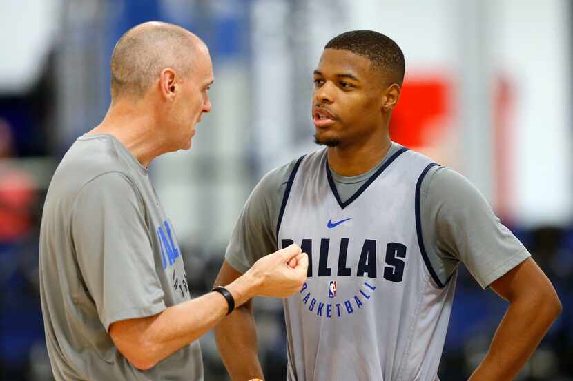 Dallas Mavericks head coach Rick Carlisle talks to Dallas Mavericks guard Dennis Smith Jr....