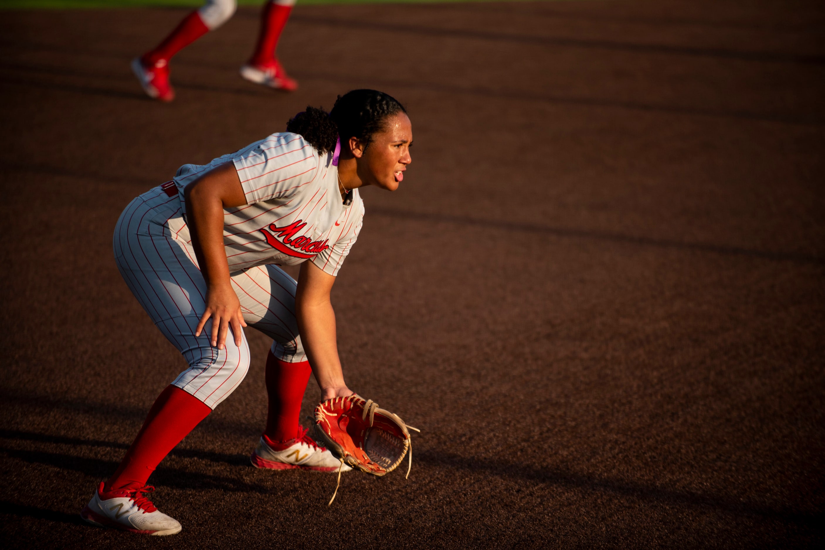 Flower Mound Marcus junior Tori Edwards (24) gets in position to make a play during Game One...