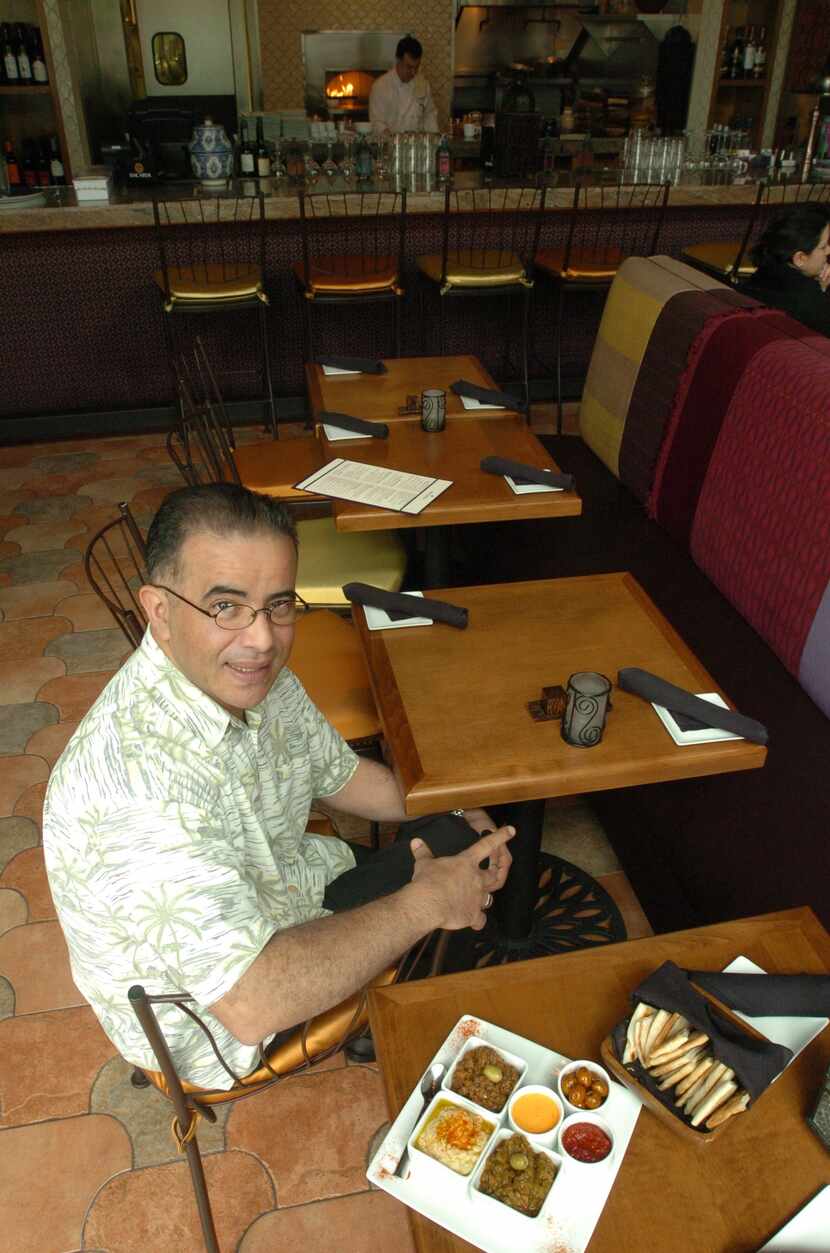 Sam Benoikken in 2009 at his restaurant, Medina Oven & Bar. 