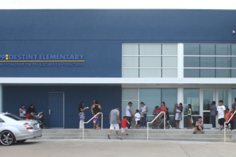Parents and students waited to get their first look at KIPP Destiny Elementary on Thursday....