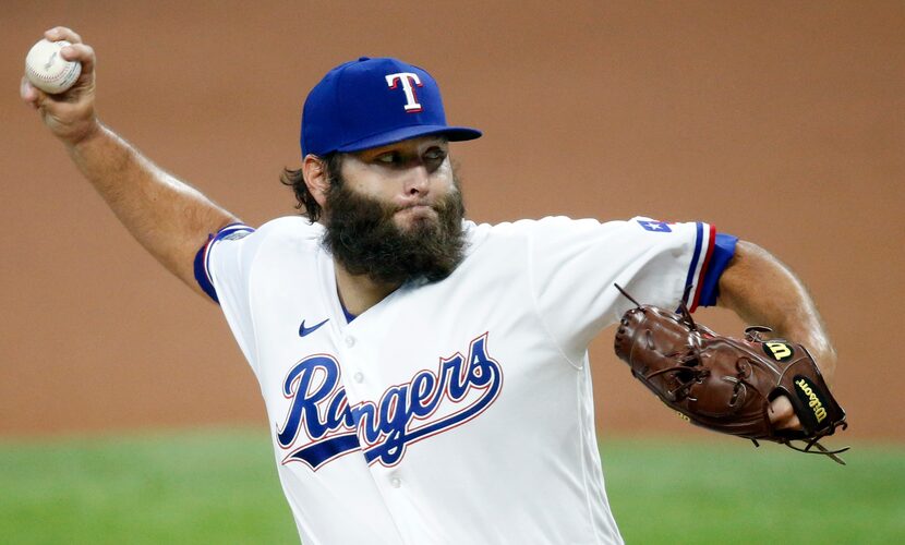 Rangers starter Lance Lynn (35) pitches during the first inning of a game against the...