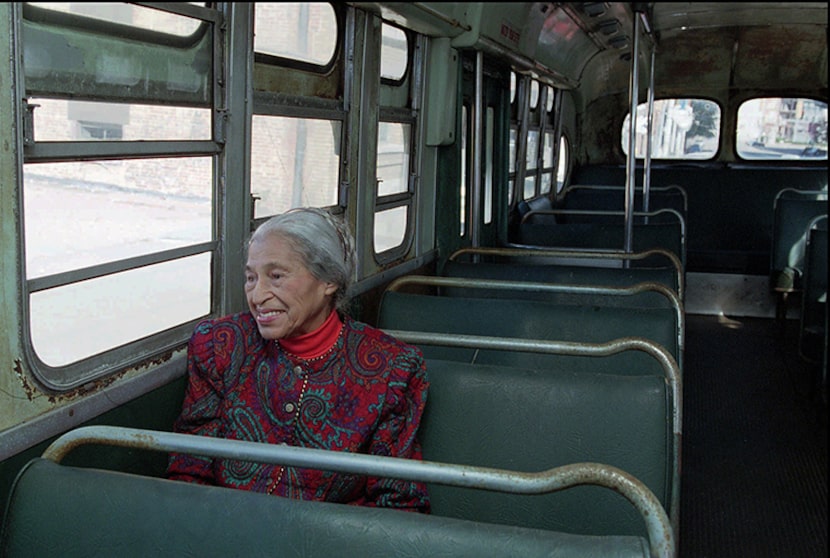  Civil rights pioneer Rosa Parks sits in a 1950s-era bus in Montgomery, Ala., in this Dec....