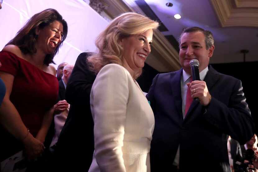 U.S. Sen. Ted Cruz (R-TX) celebrates with his wife Heidi Cruz during his election night...