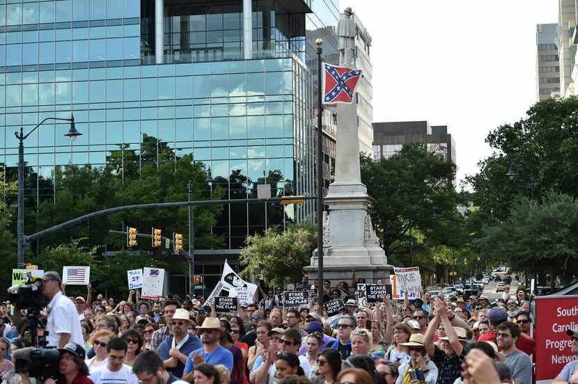 Hundreds of people gather for a protest rally against the Confederate flag in Columbia,...