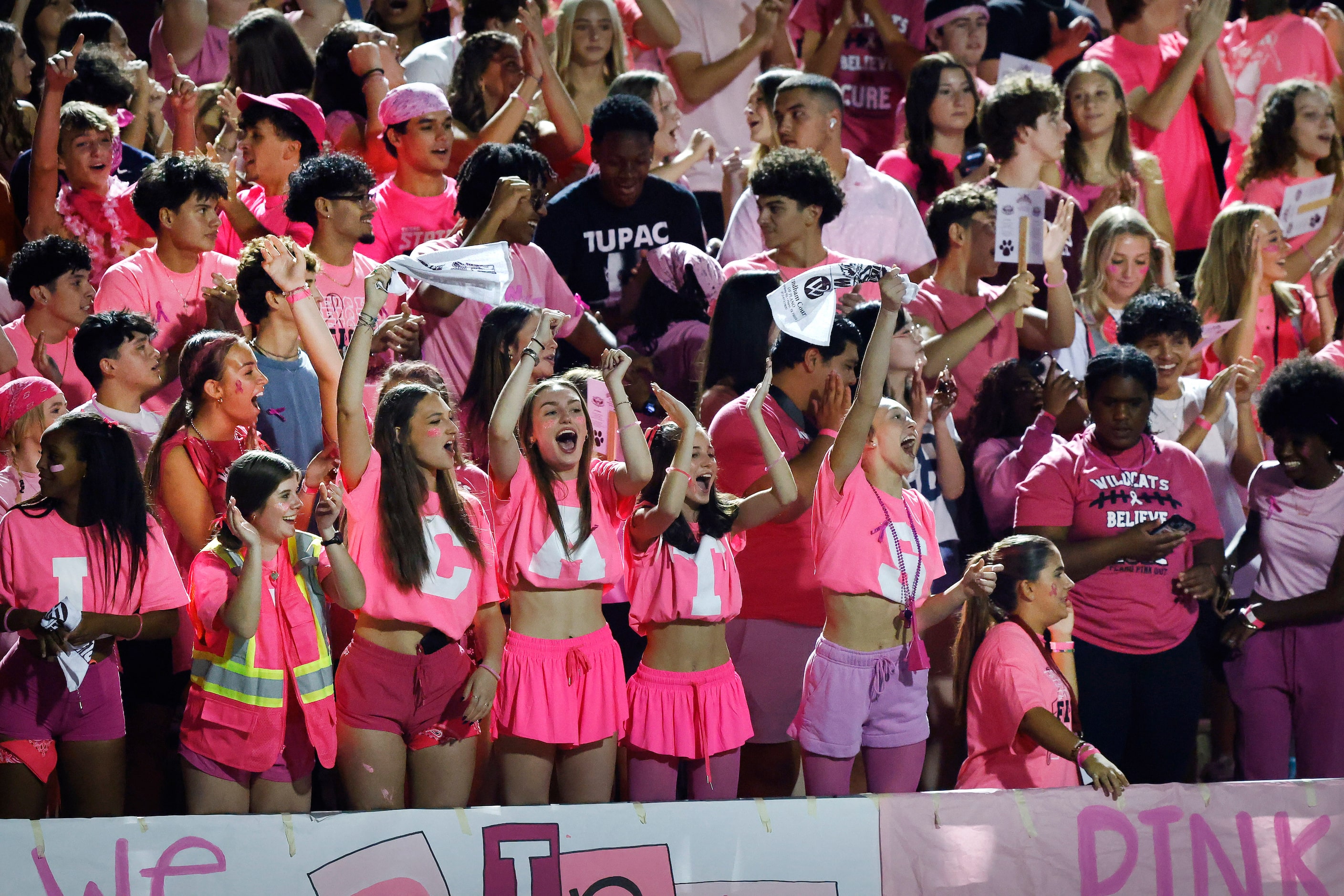 Plano High students cheer a touchdown against Prosper at Clark Stadium in Plano, October 11,...