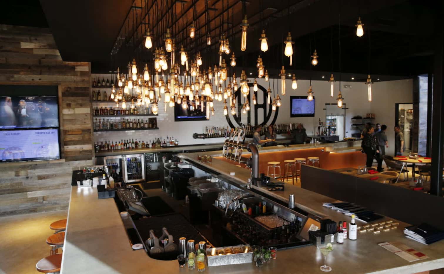 Main bar at the Happiest Hour in Dallas on Thursday, October 8, 2015. 50 beer taps are...