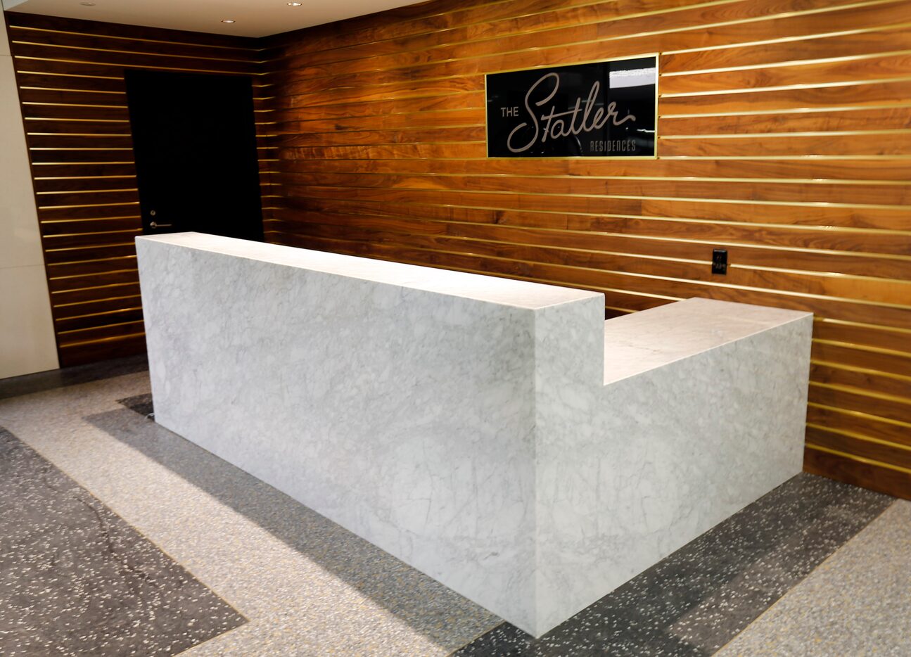 The concierge desk at the Statler Residences in downtown Dallas.