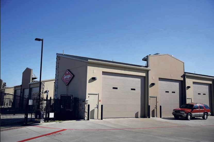 The view of the garages of Texas, a community of customizable garage suites, in Plano.  Each...