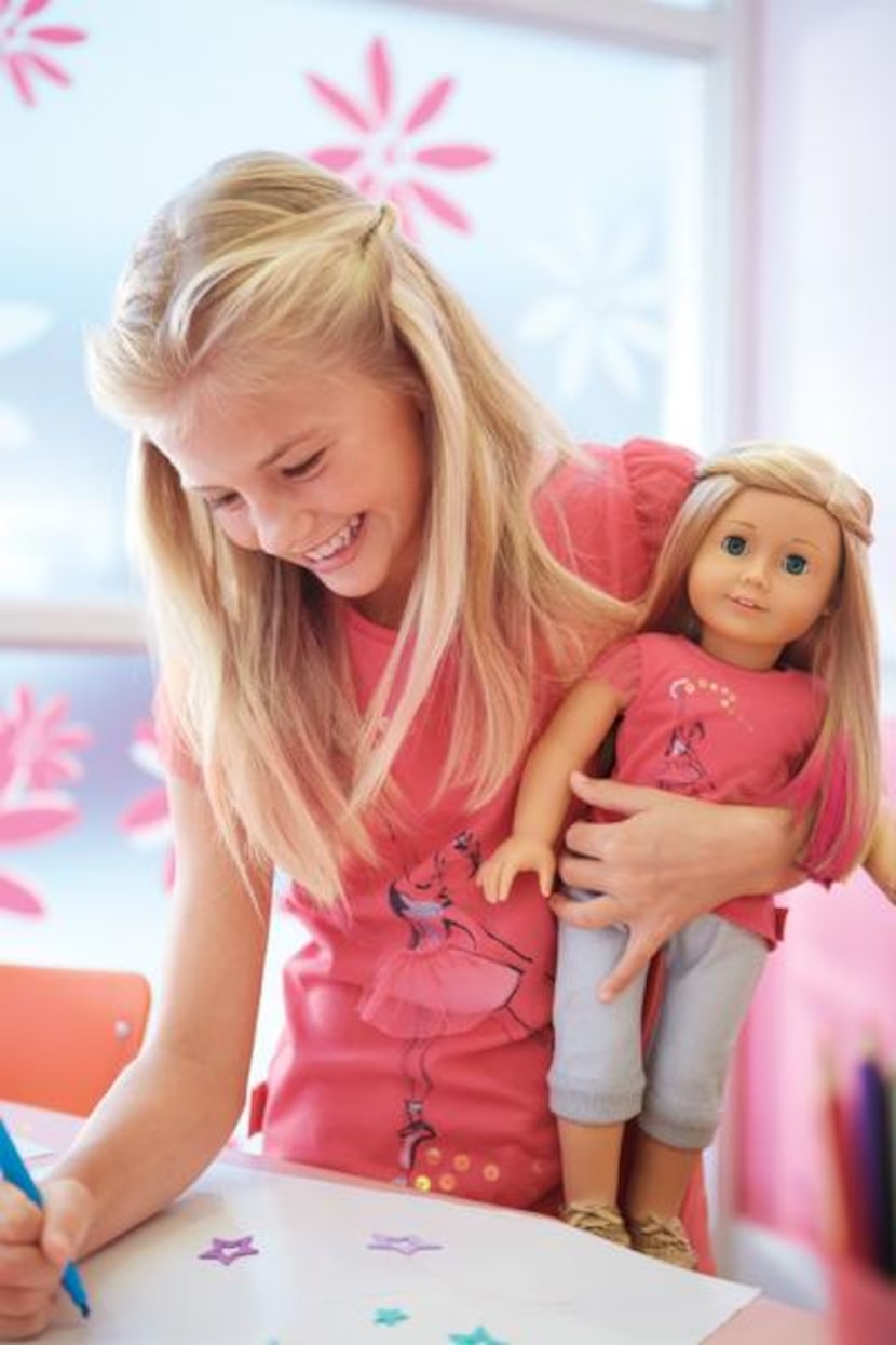 Girls can make paper doll outfits and learn about Isabelle, American Girl’s new Girl of the...