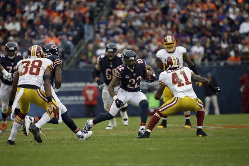 Chicago Bears running back Matt Forte (22) rushes against the Washington Redskins during the...