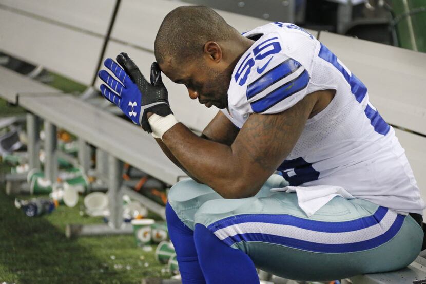 Dallas Cowboys defensive end Edgar Jones (55) sits on the bench alone with his thoughts...