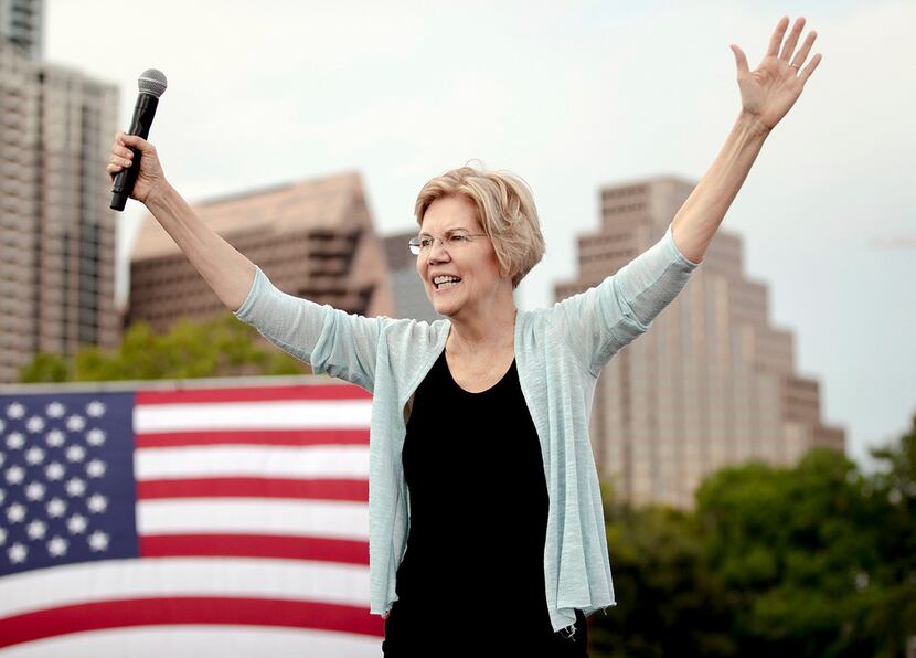 Democratic presidential candidate Elizabeth Warren acknowledges supporters during a rally on...
