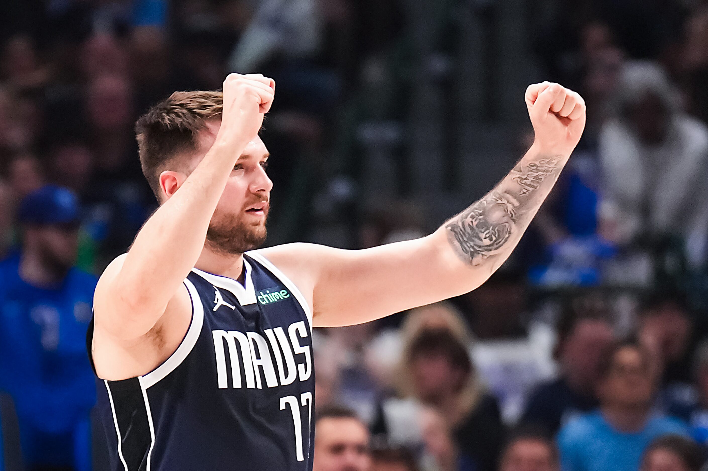 Dallas Mavericks guard Luka Doncic (77) celebrates during the first half in Game 3 of the...