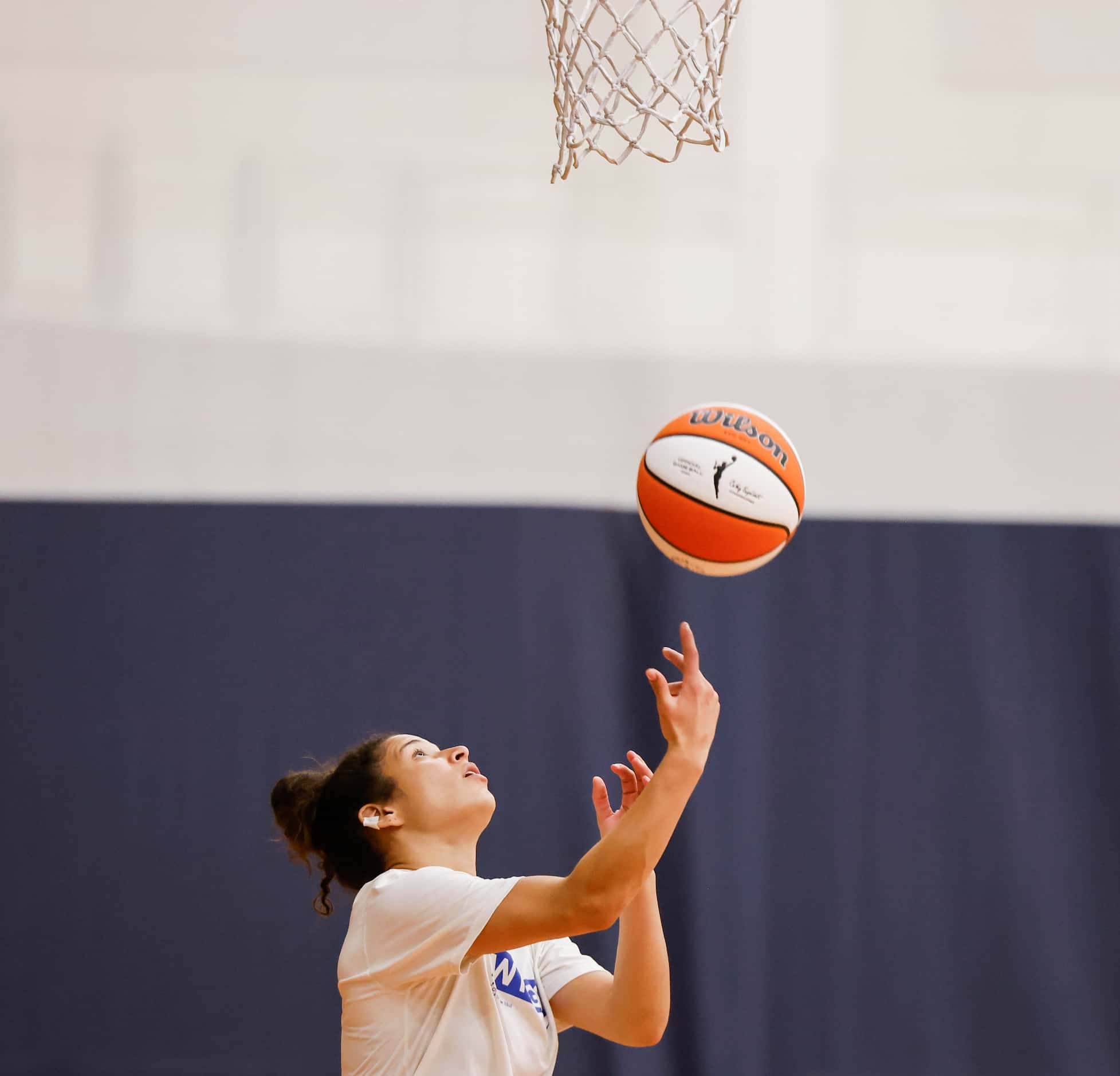 Dallas Wings top draft pick Veronica Burton practices during a training camp on Monday,...