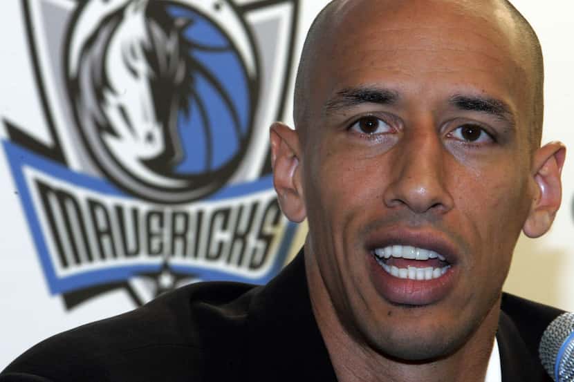 Doug Christie talks about signing with the Dallas Mavericks during a press conference on...
