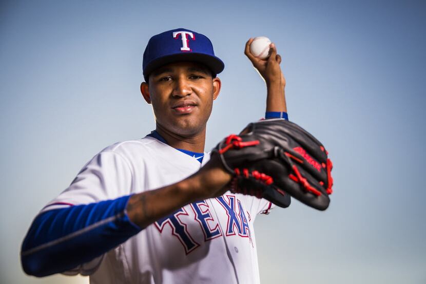 Texas Rangers pitcher Yohander Mendez photographed during spring training photo day at the...