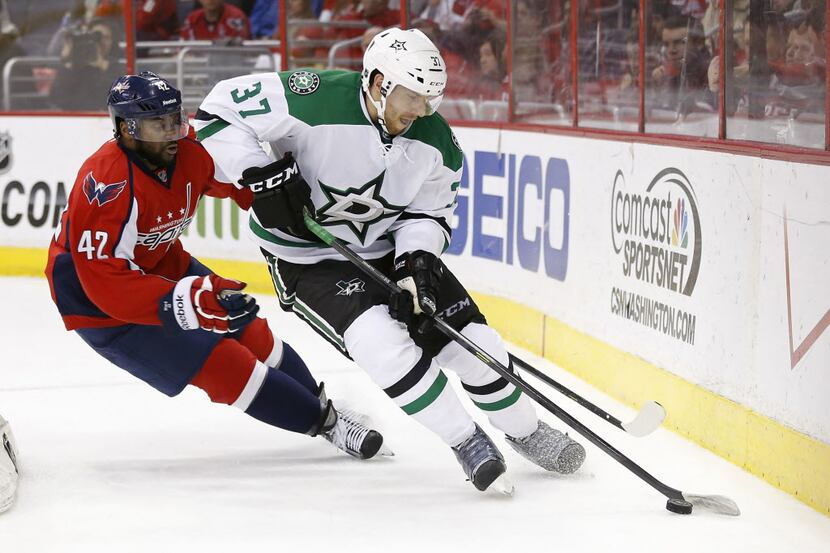 Dallas Stars defenseman Patrik Nemeth (37) skates with the puck as Washington Capitals right...