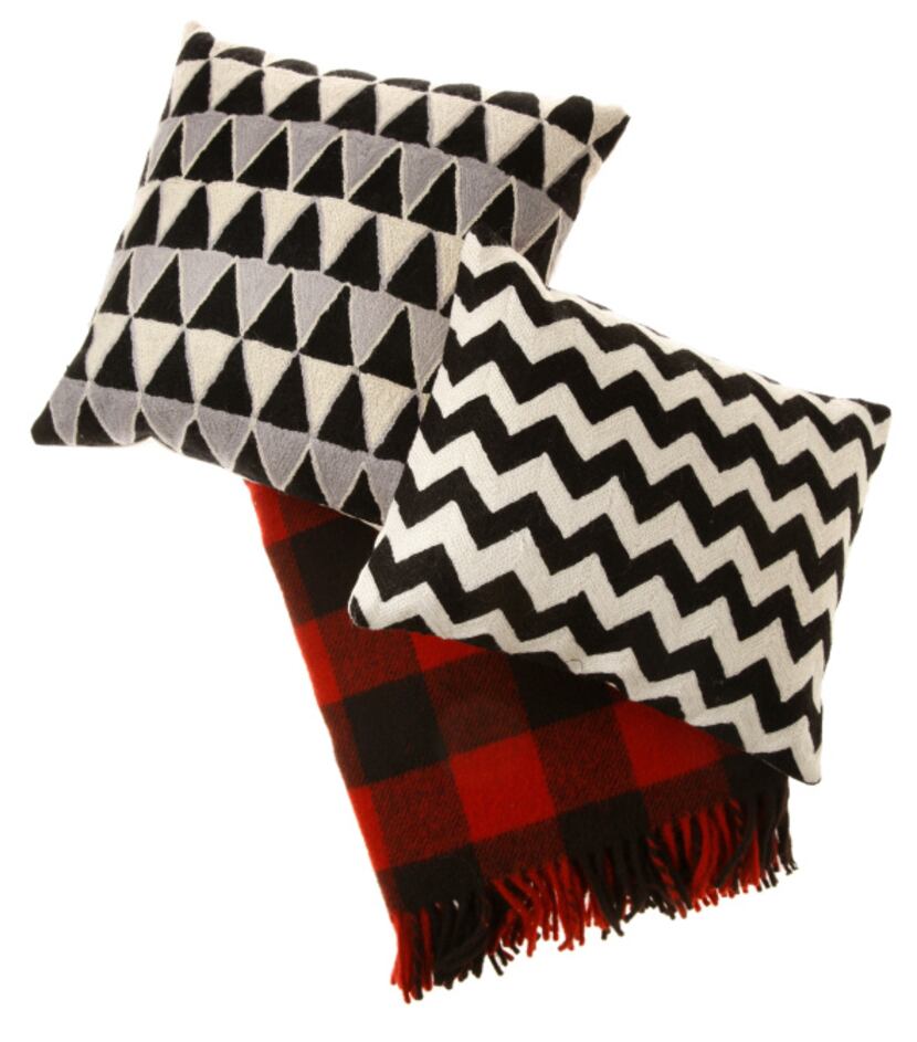 Bedtime stories: Crewel zigzag pillow ($39), Magical Thinking triangle pillow ($44) and...