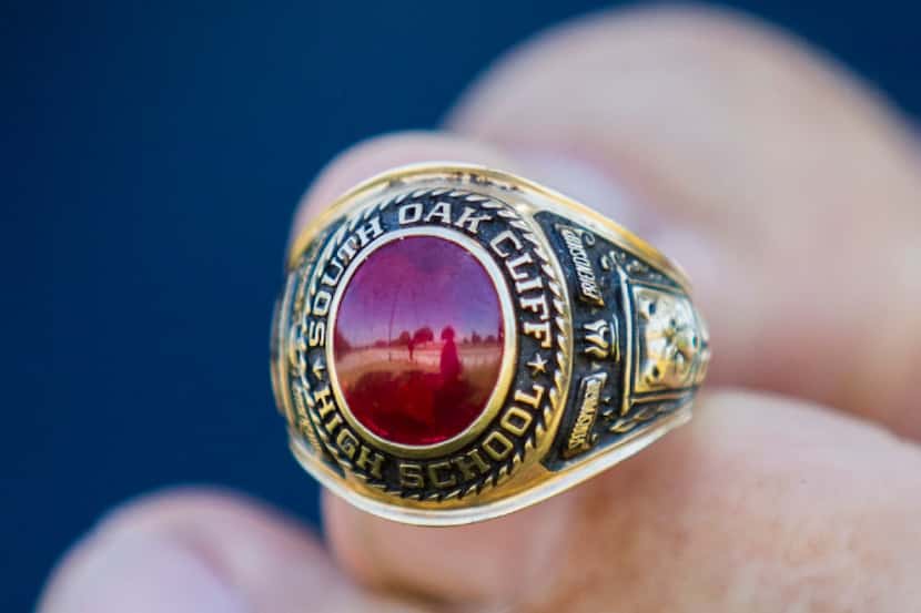 Roy Goodloe holds his 1966 South Oak Cliff High School class ring, which Perry Denton found...