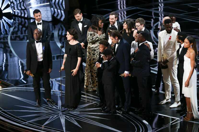 Barry Jenkins and the cast and crew of Moonlight celebrated after winning the Oscar for Best...