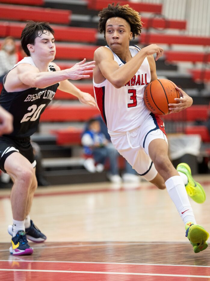 Kimball senior guard Chauncey Gibson (3) battles Bishop Lynch senior guard Logan Epes (20)...