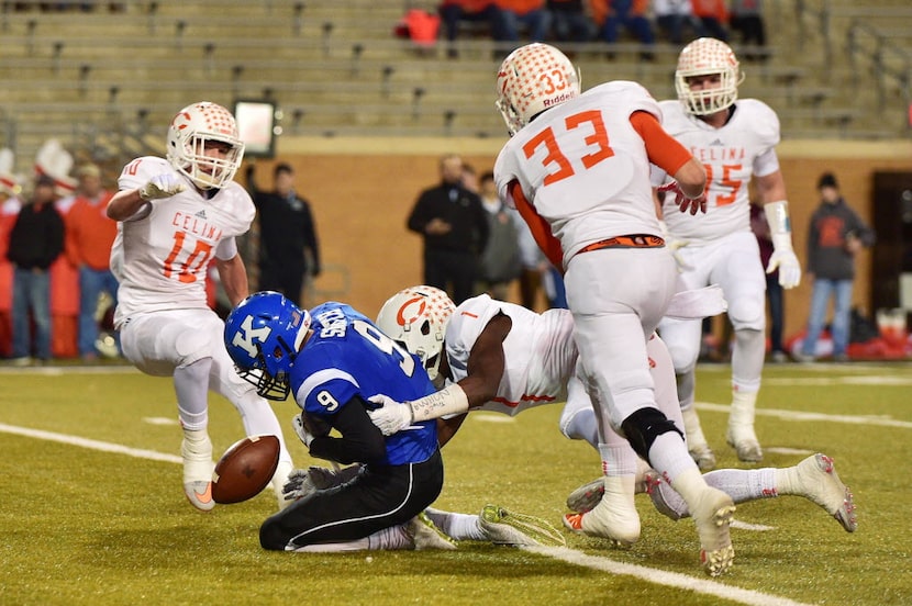 Krum junior wide receiver Jackson Smith (9) loses the ball in the end zone against Celina,...