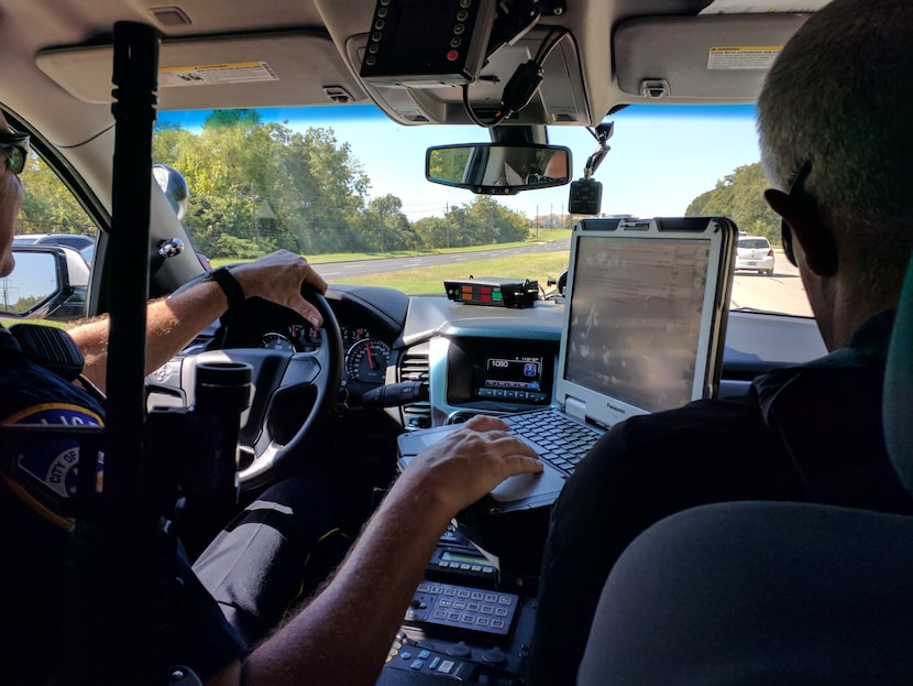 Officer Casey Sanders (left) and BIU Mental Health Coordinator Ken Bennett patrol a...