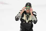 Dallas Stars center Wyatt Johnston dons a pair of sunglasses tossed to him from the crowd...