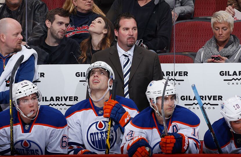GLENDALE, AZ - DECEMBER 16:  Interim coach Todd Nelson of the Edmonton Oilers on the bench...
