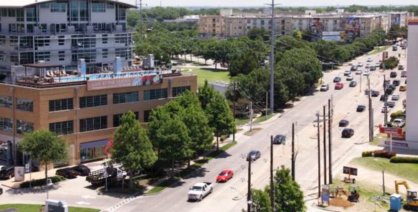 
This rooftop view from the Hotel Palomar shows where a suspension bridge is being built...