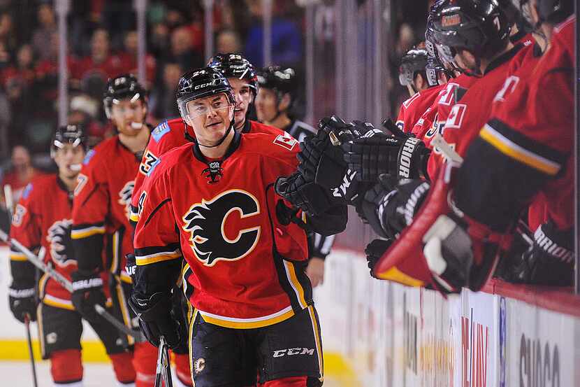 CALGARY, AB - FEBRUARY 5: Jiri Hudler #24 of the Calgary Flames celebrates with the bench...