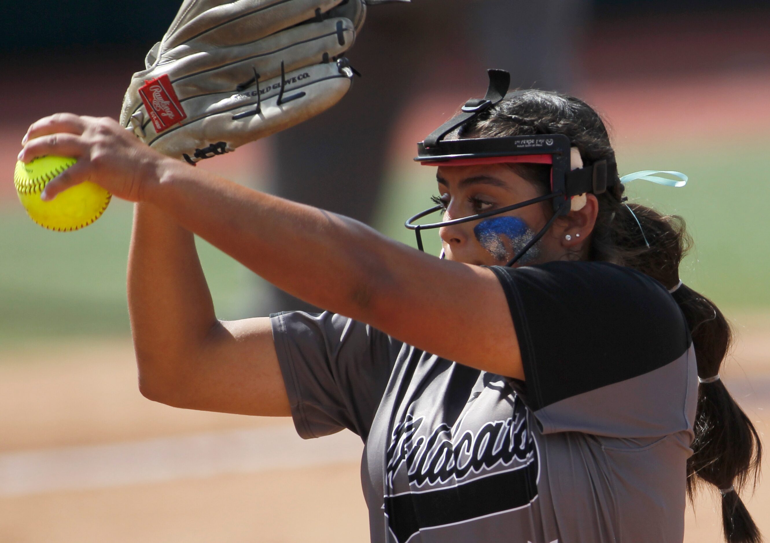 Denton Guyer pitcher Jenny Robledo (5) delivers a pitch to a Pearland batter during the...