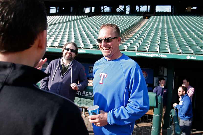 Texas Rangers manager Jeff Banister laughs with the media during the Rangers winter camp at...
