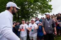 Scottie Scheffler is greeted by fans after the second round of the PGA Championship golf...