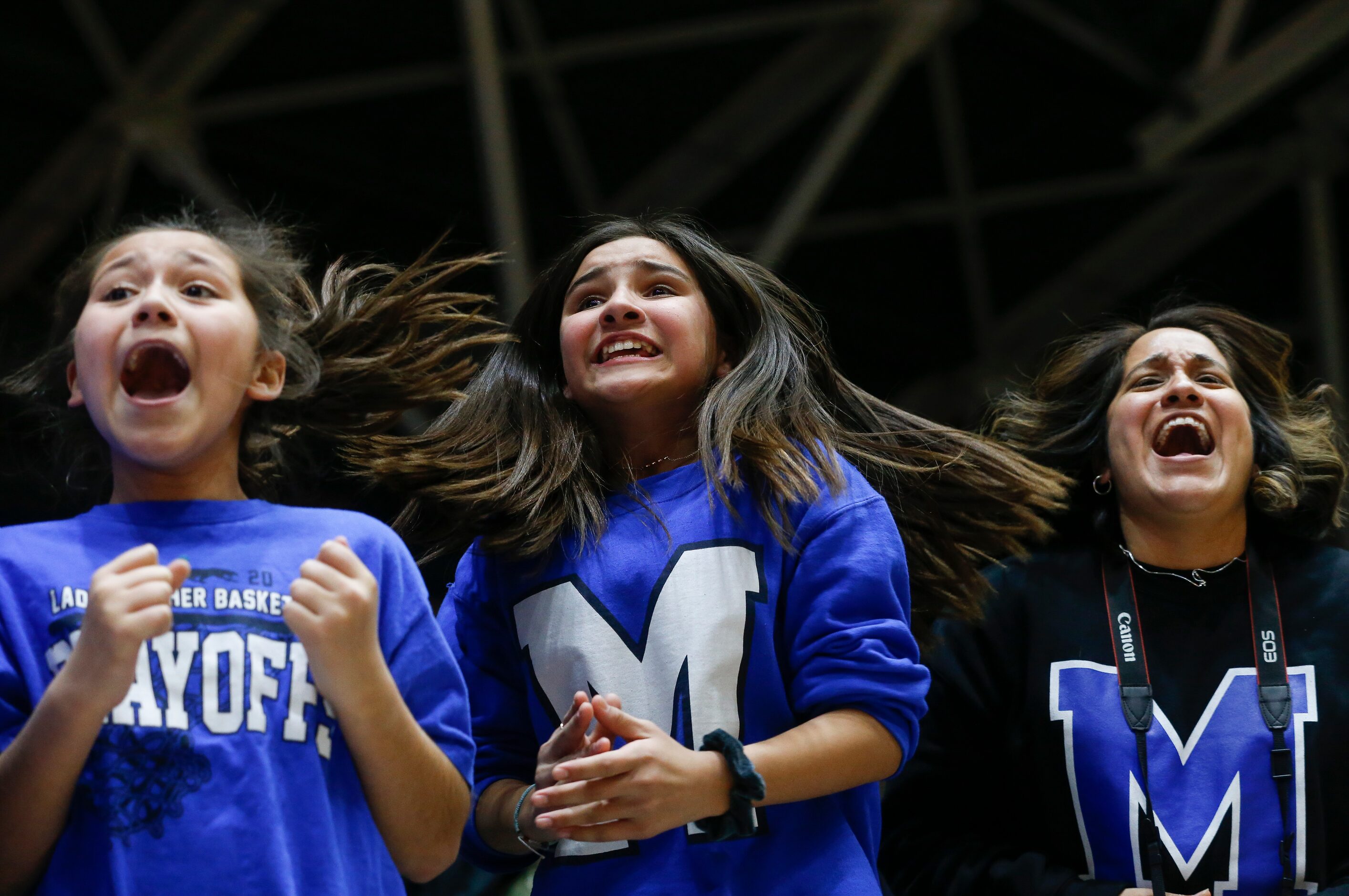 Kyla Crawford, 10, left, and Mackenzie Barnes, 11, and Estela Crawford celebrate...