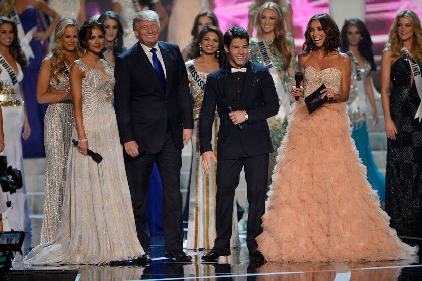 From left:  Miss Universe 2012 Olivia Culpo, Donald Trump, recording artist and host Nick...