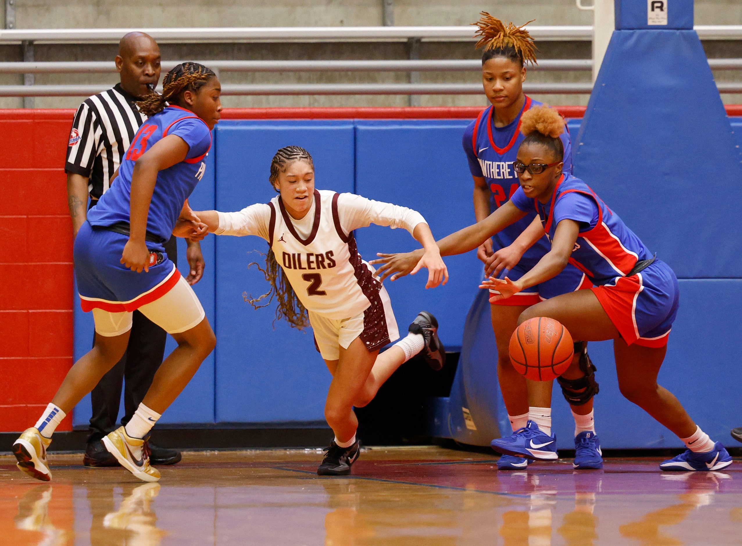 Duncanville's Samari Holmen (13) from left, Pearland's A’Zyua Blair (2) , Duncanville's...