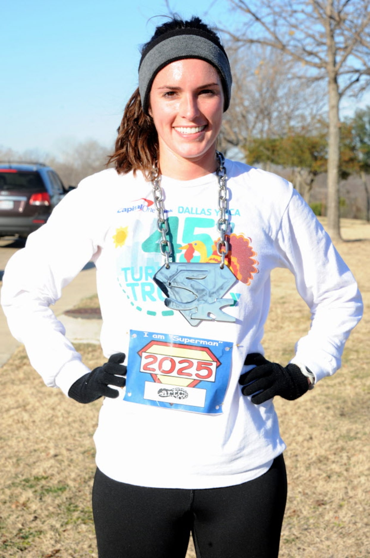 Overall women's first place runner Jessica Card is all smiles after her top place finish in...