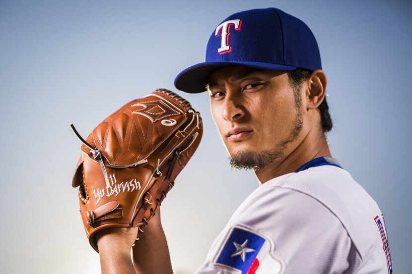 Texas Rangers pitcher Yu Darvish photographed during spring training photo day at the team's...