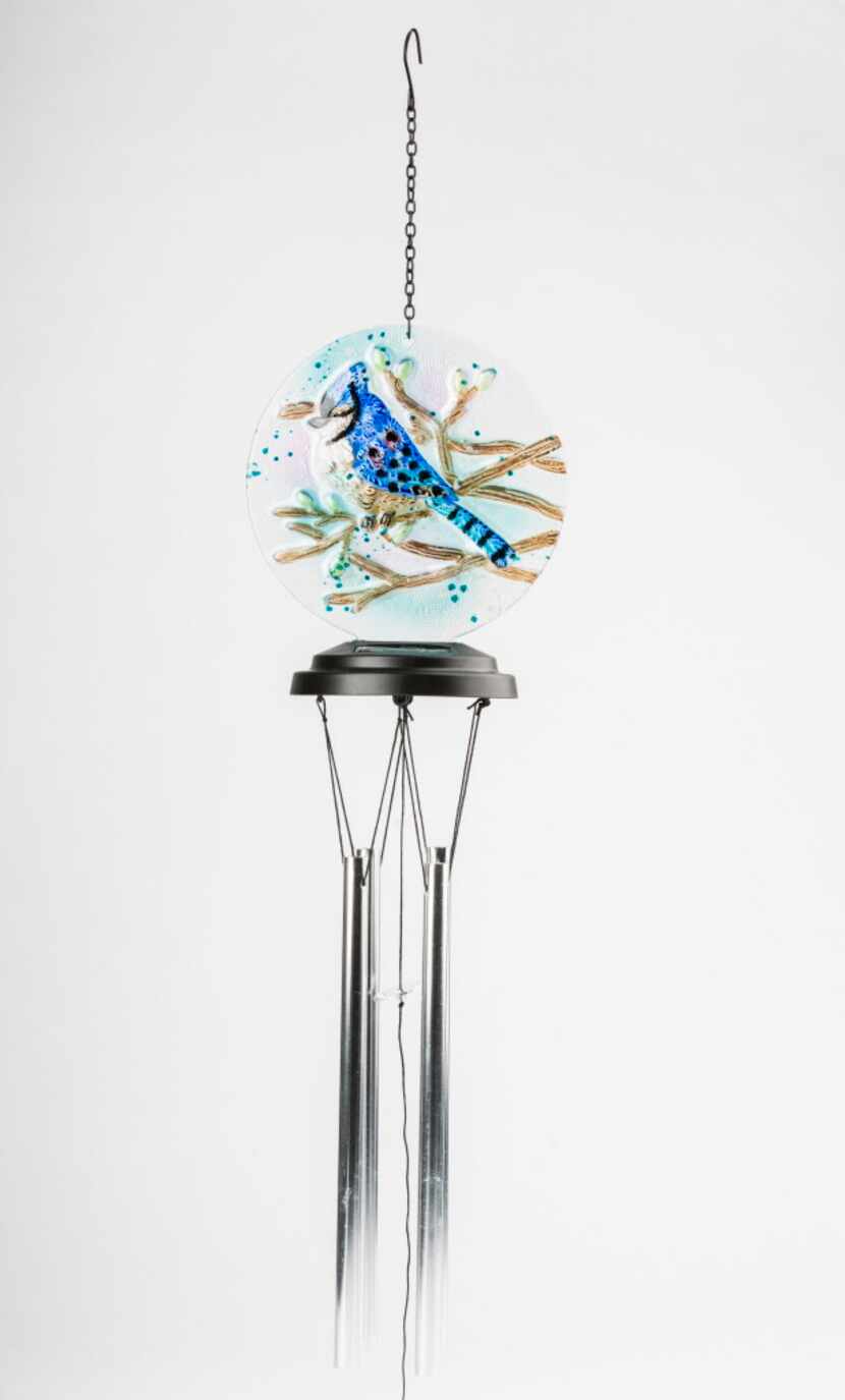 A blue jay adorns solar wind chimes that glow at night. $26.99 at the Dallas Arboretum’s...