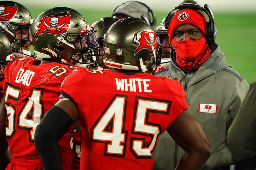 Tampa Bay Buccaneers defensive coordinator Todd Bowles with players during game vs New York...