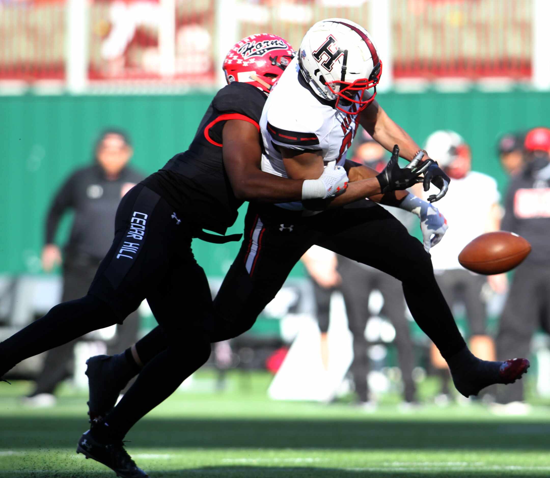 Rockwall Heath tight end Lance Mason (38) is unable to pull in a long pass as he is defended...