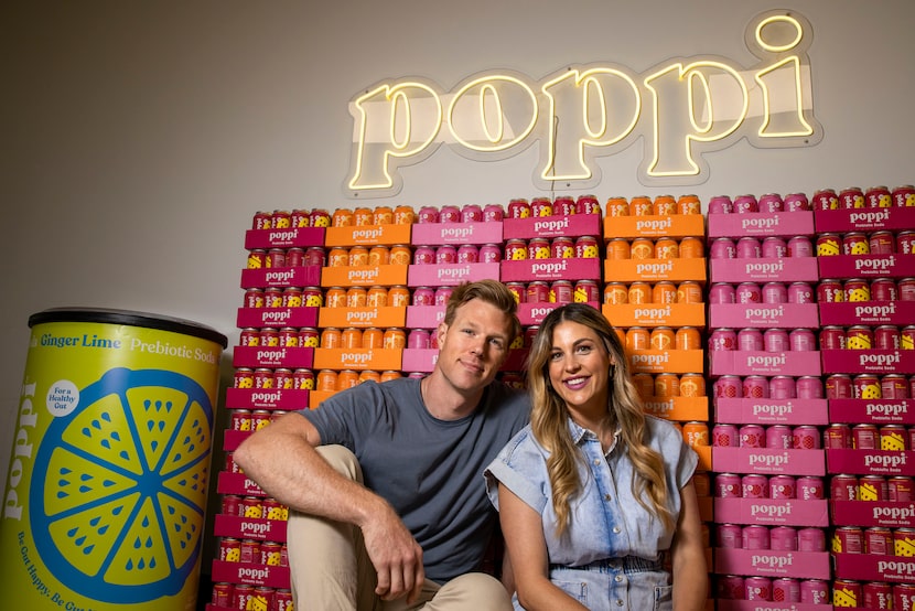 Husband and wife team Stephen, left, and Allison Ellsworth pose for a portrait at the poppi...